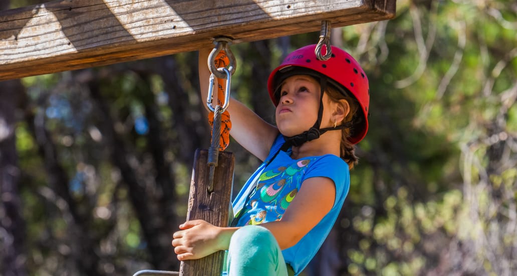 Girl on challenge course