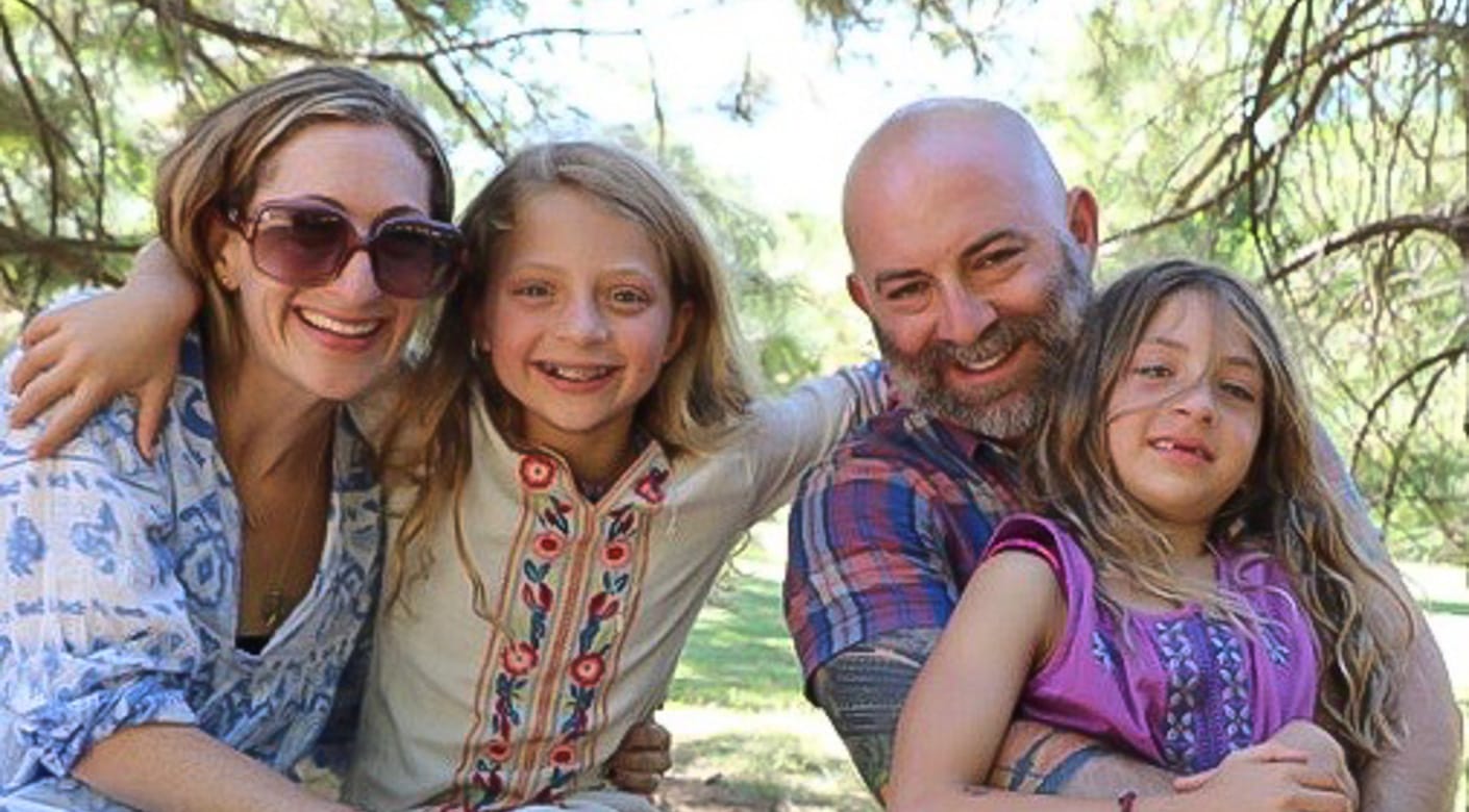 Family smiling at family camp