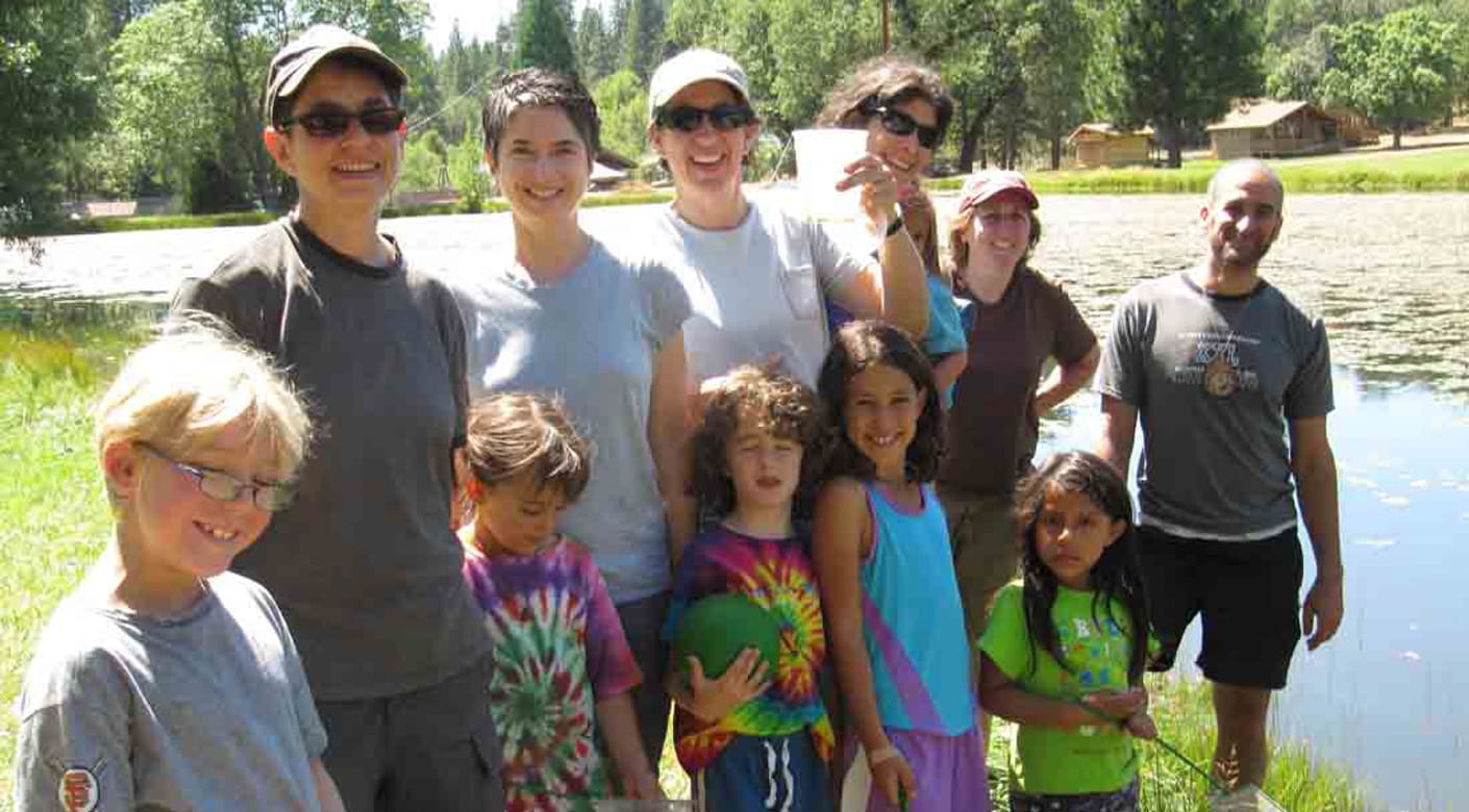 Family smiling at family camp