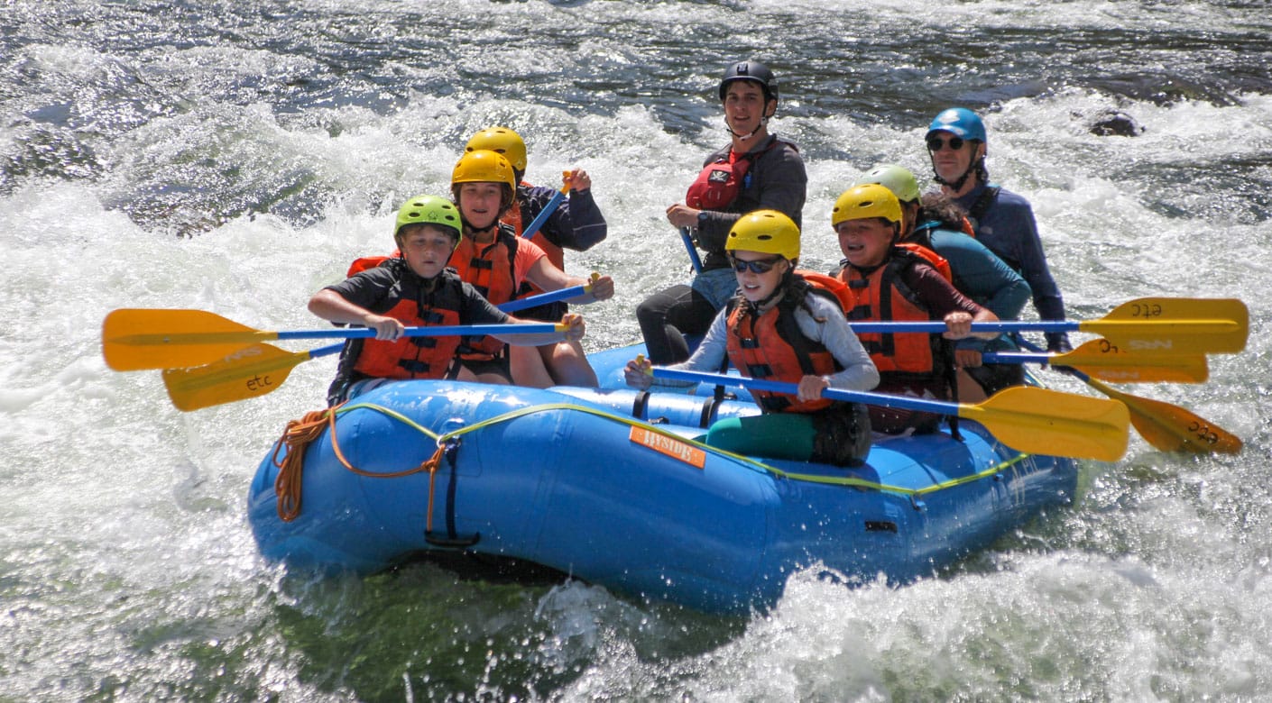 Teens rafting on an adventure quest