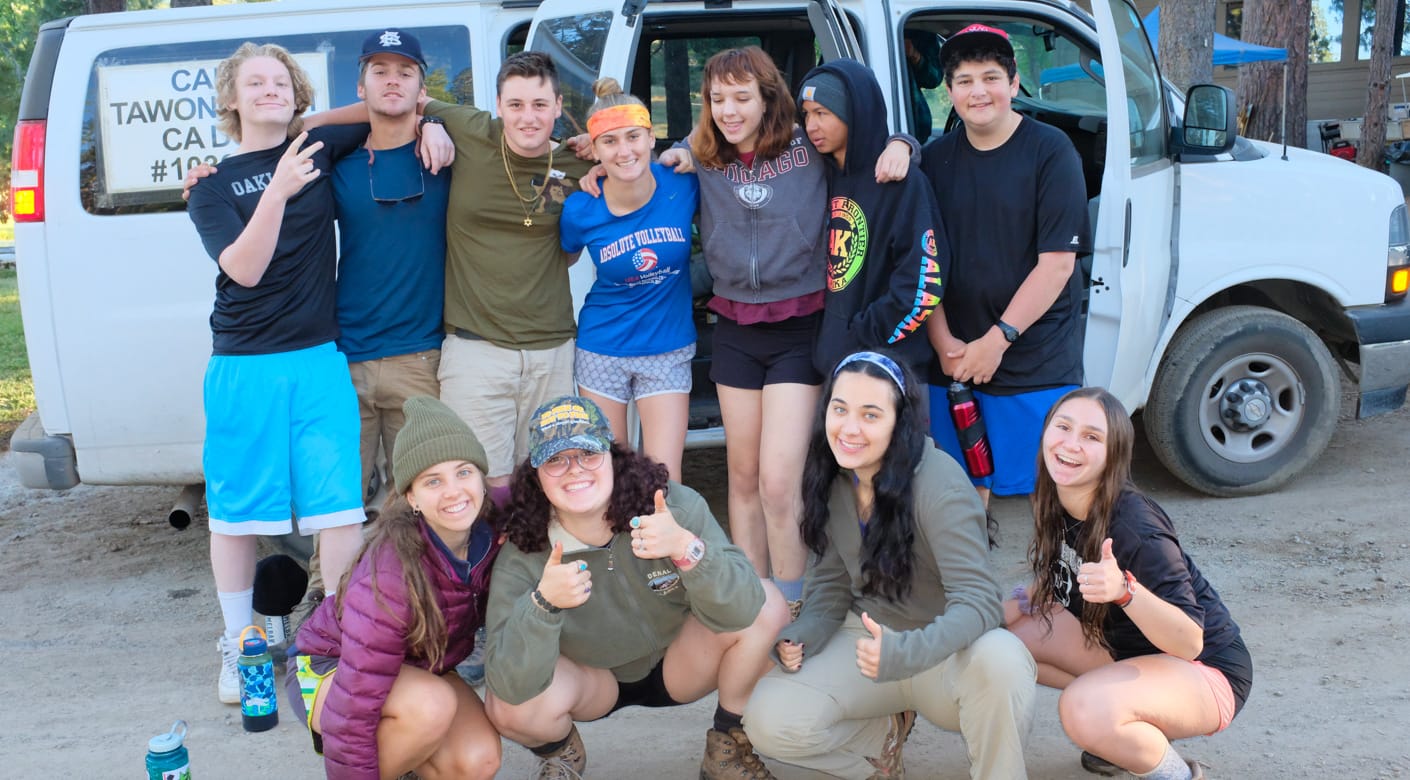 Teens posing for a group photo at Teen Leadership program