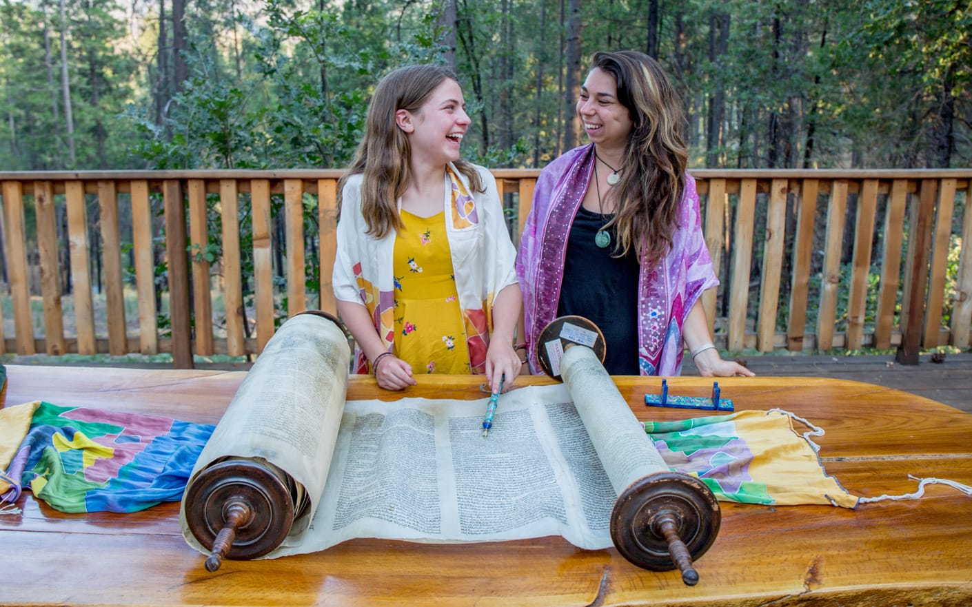 Girl and staff reading the Torah at a bat mitzvah