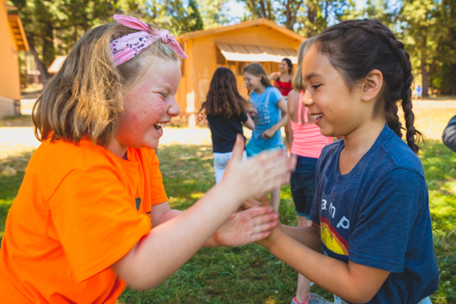 Girl playing patty cake game