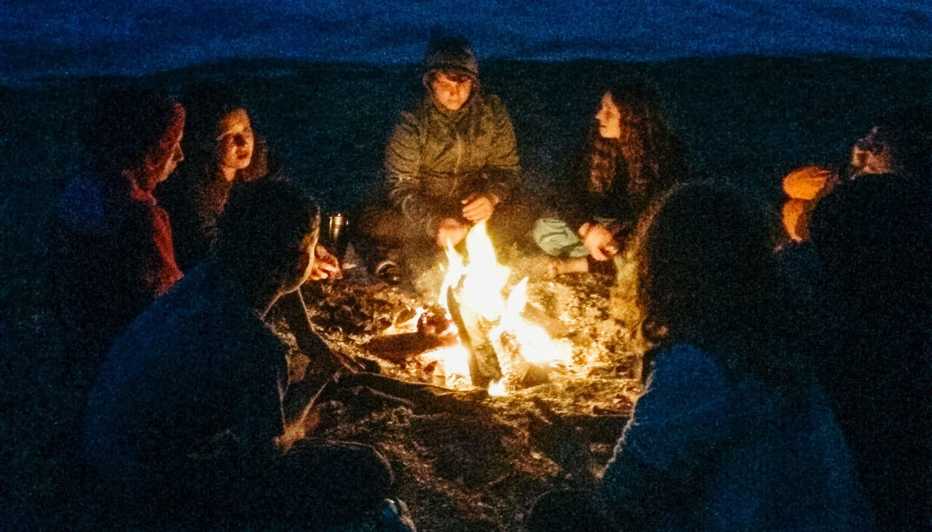 Cozying up by campfire on the Magical Mystery quest