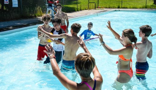 Boys swimming in pool