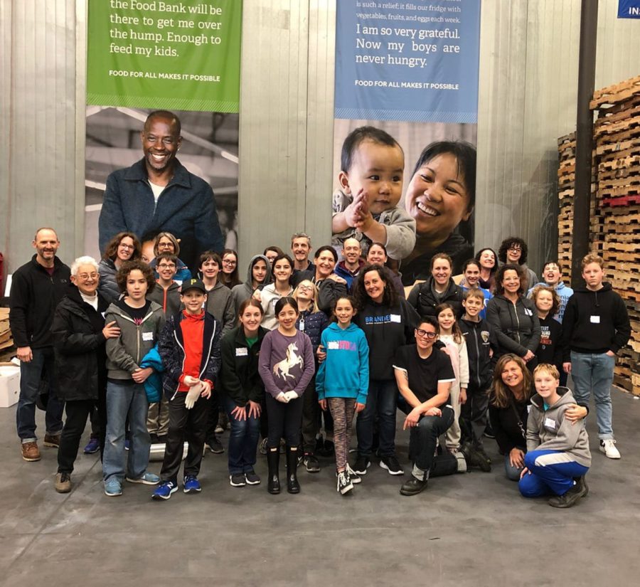 Family volunteering at a food bank